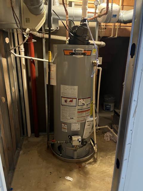 Power-vent water heater installed by Mayes Plumbing & Heating in Elkridge, MD