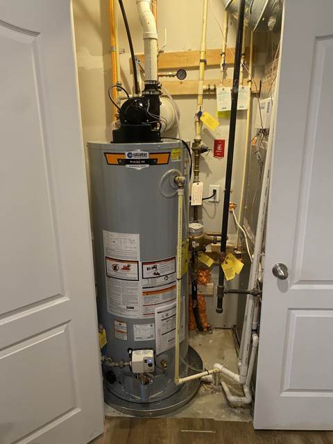 Power-vent water heater installed by Mayes Plumbing & Heating in Lanham, MD